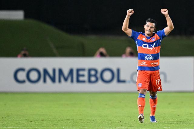 Puerto Cabello's forward #19 Jean Castillo celebrates scoring his team's third goal during the Copa Sudamericana group stage football match between Venezuela's Academia Puerto Cabello and Peru's Cienciano at the Misael Delgado stadium in Valencia, state of Carabobo, Venezuela on May 5, 2026. (Photo by Juan BARRETO / AFP)
