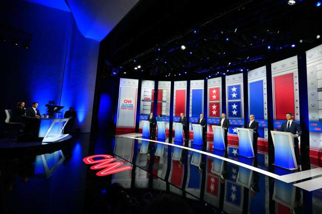 (L/R) Moderators Kaitlan Collins and Elex Michaelson face Democratic candidate Antonio Villaraigosa, Democratic candidate Katie Porter, Democratic candidate Tom Steyer, Republican candidate Steve Hilton, Republican candidate Chad Bianco, Democratic candidate Xavier Becerra and Democratic candidate Matt Mahan as they participate in a California gubernatorial debate at the East Los Angeles College Auditorium in Monterey Park, California, on May 5, 2026. Seven candidates for California governor are participating in the third televised debate, ahead of the June 2, 2026 primary elections. (Photo by Frederic J. Brown / AFP)