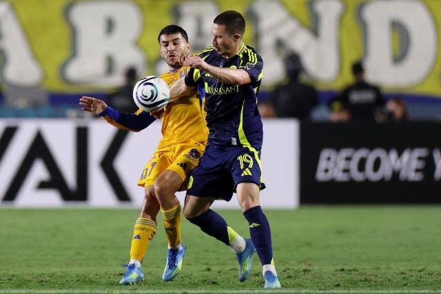 Tigres' Argentine forward #07 Angel Correa and Nashville's midfielder #19 Alex Muyl fight for the ball during the CONCACAF Champions Cup semifinal second leg football match between Mexico's Tigres and US' Nashville SC at Universitario de la UANL stadium in San Nicolas de los Garza, Nuevo Leon state, Mexico, on May 5, 2026. (Photo by Julio Cesar AGUILAR / AFP)