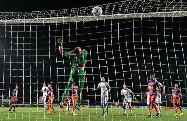 Puerto Cabello's goalkeeper #01 Joel Graterol makes a save during the Copa Sudamericana group stage football match between Venezuela's Academia Puerto Cabello and Peru's Cienciano at the Misael Delgado stadium in Valencia, state of Carabobo, Venezuela on May 5, 2026. (Photo by Juan BARRETO / AFP)