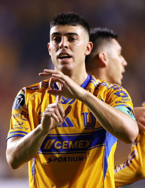 Tigres' Argentine midfielder #11 Juan Brunetta celebrates after scoring the opening goal during the CONCACAF Champions Cup semifinal second leg football match between Mexico's Tigres and US' Nashville SC at Universitario de la UANL stadium in San Nicolas de los Garza, Nuevo Leon state, Mexico, on May 5, 2026. (Photo by Julio Cesar AGUILAR / AFP)