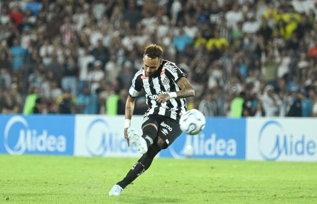 Santos' forward #10 Neymar kicks the ball during the Copa Sudamericana group stage football match between Paraguay's Deportivo Recoleta and Brazil's Santos at the Rio Parapiti stadium in Pedro Juan Caballero, Paraguay, on May 5, 2026. (Photo by DANIEL DUARTE / AFP)