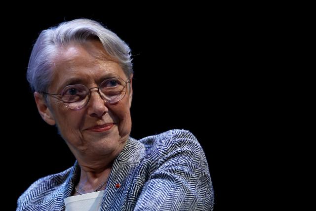 (FILES) Ensemble Pour la Republique's MP Elisabeth Borne attends a debate session of the “Grand Dйbat des Gracques” on major national issues, at the Theatre de la Cite Internationale in Paris on April 11, 2026. French former Prime Minister Elisabeth Borne announced on May 6, 2026 that she was stepping down from the leadership of the Renaissance party, although she will remain a member, stating that she does not “fully identify” with the approach taken by Gabriel Attal. (Photo by Ian LANGSDON / AFP)