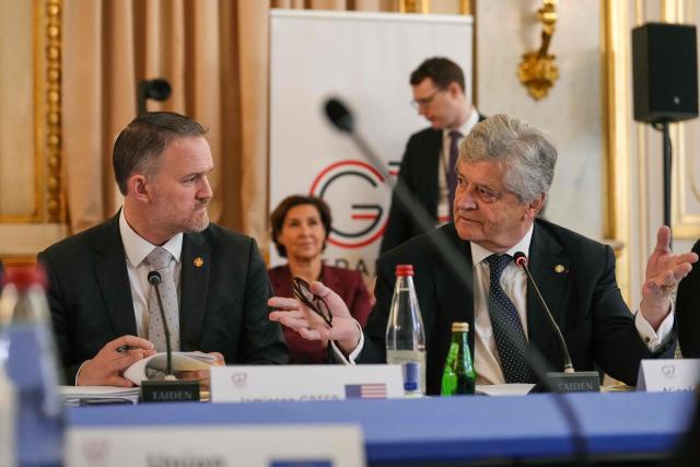 U.S. Trade Representative Jamieson Greer (L) speaks with France's junior Minister in charge of external trade Nicolas Forissier as they attend a meeting of the G7 countries in preparation for the summit of heads of State and government to be held in June in Evian, in Paris on May 6, 2026. (Photo by Aurelien Morissard / POOL / AFP)