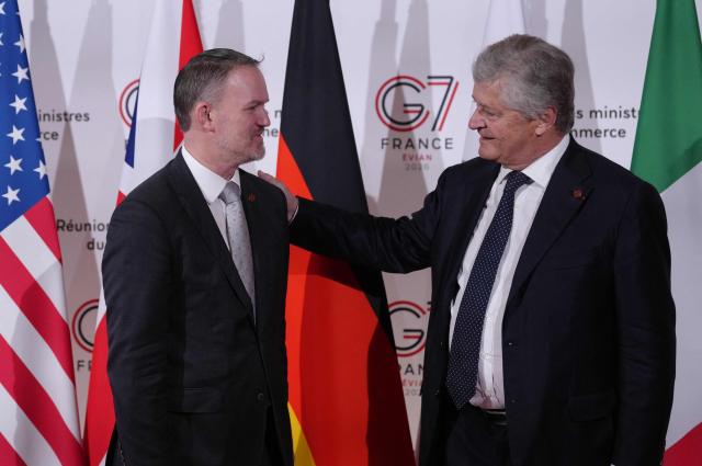 France’s Trade Minister Nicolas Forissier (R) welcomes US Trade Representative Jamieson Greer for a meeting of the G7 countries in preparation for the summit of heads of State and government to be held in June in Evian, in Paris on May 6, 2026. (Photo by Aurelien Morissard / POOL / AFP)