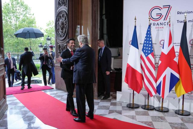 Canada's International Trade Minister Maninder Sidhu (L) is welcomed by France's Trade Minister Nicolas Forissier upon arrival for a meeting of the Trade Ministers of the G7 countries in preparation for the summit of heads of State and government to be held in June in Evian, in Paris on May 6, 2026. (Photo by Aurelien Morissard / POOL / AFP)