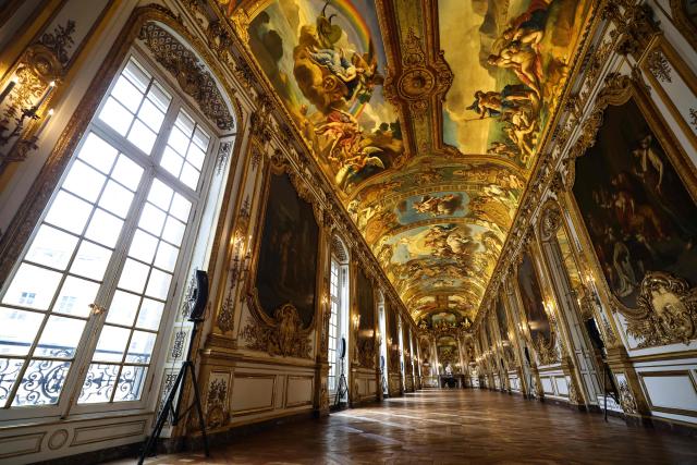 This photograph shows golden decorations, paintings and ornamental sculptures inside the golden hall of the Banque de France, the French central bank, at the Hotel de Toulouse building, in Paris on May 6, 2026. (Photo by Anne-Christine POUJOULAT / AFP)