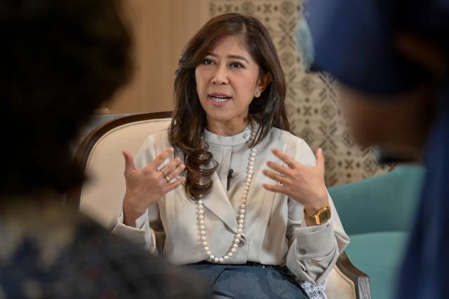 Indonesia's Communication and Digital Affairs Minister Meutya Hafid answers questions during an interview with AFP at her official residence in Jakarta on May 6, 2026. Indonesia's government is mulling an e-commerce ban for under-16s, the communications minister told AFP on May 6, hot on the heels of Jakarta imposing a sweeping social media prohibition for teens. (Photo by BAY ISMOYO / AFP) / To go with AFP story Indonesia-internet-children,INTERVIEW by Marchio Gorbiano
