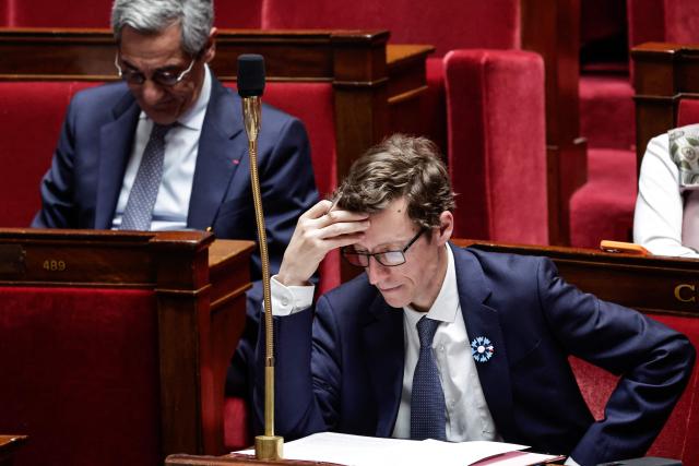France's Education Minister Edouard Geffray (C) looks at his notes during a session of questions to the government at The National Assembly, France's lower house of parliament in Paris on May 6, 2026. (Photo by STEPHANE DE SAKUTIN / AFP)