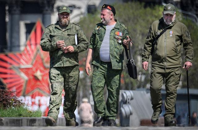 Russian veterans of the Russian-Ukrainian conflict walk outside the Museum of the Great Patriotic War (also known as the Victory Museum ) at Poklonnaya Hill in western Moscow on May 6, 2026, few days ahead of the Victory Day military parade, to be held at Red Square on May 9. Russia declared on May 4 a unilateral ceasefire with Ukraine between May 8-9, when Moscow marks its annual World War II Victory Day commemorations, and threatened a "massive missile strike" on Kyiv if Ukraine violated it. (Photo by Alexander NEMENOV / AFP)