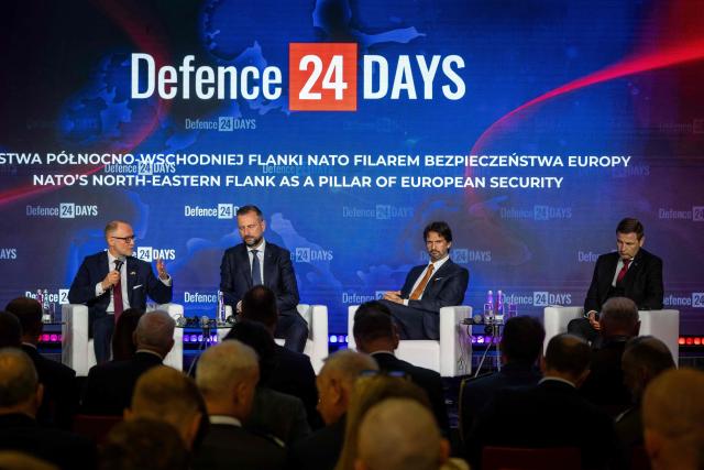Latvia's Defence Minister Andris Spruds (L), Poland's Deputy Prime Minister and Defence Minister Wladyslaw Kosiniak-Kamysz (2nd L), Slovakia's Deputy Prime Minister and Defence Minister Robert Kalinak (2nd R), and Estonia's Defence Minister Hanno Pevkur (R) take part in the panel discussion "NATO’s north-eastern flank as a pillar of European security" at "Defence24 Days" – a conference on defence and security attended by various leaders and experts from the region, in Warsaw, Poland, on May 6, 2026. (Photo by Wojtek RADWANSKI / AFP)