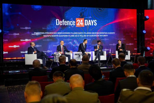 Latvia's Defence Minister Andris Spruds (2nd L), Poland's Deputy Prime Minister and Defence Minister Wladyslaw Kosiniak-Kamysz (C), Slovakia's Deputy Prime Minister and Defence Minister Robert Kalinak (2nd R), and Estonia's Defence Minister Hanno Pevkur (R) take part in the panel discussion "NATO’s north-eastern flank as a pillar of European security" at "Defence24 Days" – a conference on defence and security attended by various leaders and experts from the region, in Warsaw, Poland, on May 6, 2026. (Photo by Wojtek RADWANSKI / AFP)