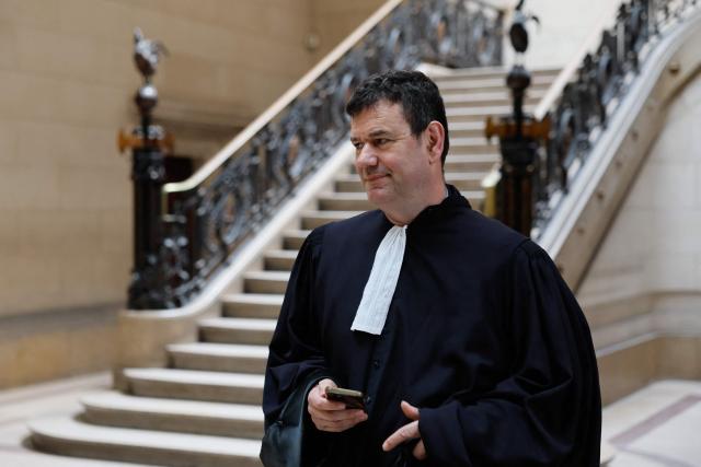 French lawyer Philippe Meilhac, who represents Agathe Habyarimana, arrives at the Paris courthouse before the ruling on the Rwandan Tutsi genocide case against his client, widow of Rwandan president Juvenal Habyarimana whose assassination sparked the 1994 genocide, on May 6, 2026. France's judiciary on May 6, 2026 ordered the resumption of an investigation into accusations the widow of Rwanda's former president Juvenal Habyarimana was involved in the 1994 genocide. (Photo by Xavier GALIANA / AFP)