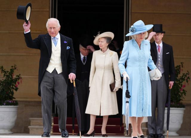 Britain's King Charles III and Britain's Queen Camilla (2R), along with Britain's Princess Anne, Princess Royal (C) and Britain's Prince Edward, Duke of Edinburgh (R) attend a Royal Garden Party at Buckingham Palace, in London, on May 6, 2026. (Photo by Aaron Chown / POOL / AFP)