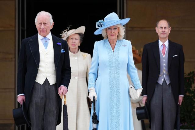 Britain's King Charles III and Britain's Queen Camilla, along with Britain's Princess Anne, Princess Royal (2L) and Britain's Prince Edward, Duke of Edinburgh (R) attend a Royal Garden Party at Buckingham Palace, in London, on May 6, 2026. (Photo by Aaron Chown / POOL / AFP)