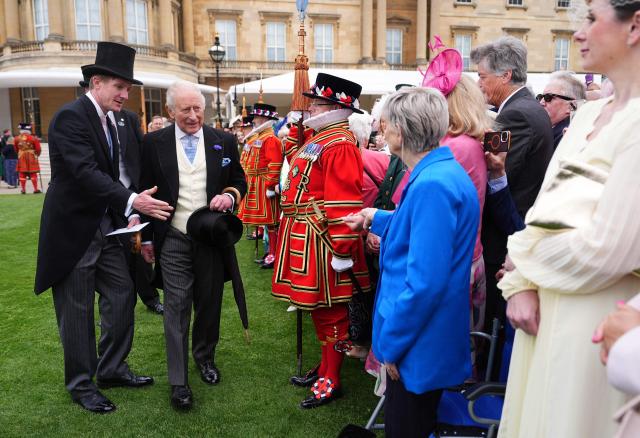 Britain's King Charles III meets Barbara Keel, who started the Barby Keel Animal Sanctuary, during a Royal Garden Party at Buckingham Palace, in London, on May 6, 2026. (Photo by Aaron Chown / POOL / AFP)
