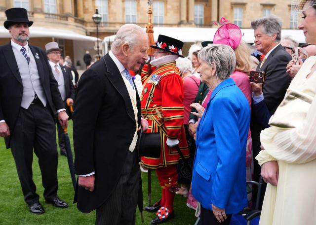 Britain's King Charles III meets Barbara Keel, who started the Barby Keel Animal Sanctuary, during a Royal Garden Party at Buckingham Palace, in London, on May 6, 2026. (Photo by Aaron Chown / POOL / AFP)