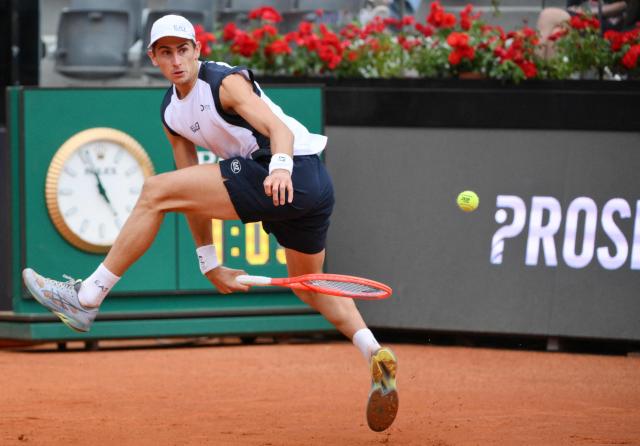 Italian Matteo Arnaldi hits a return to Spanish Jaume Munar during the ATP Rome Open tennis tournament at Foro Italico in Rome on May 6, 2026. (Photo by Tiziana FABI / AFP)