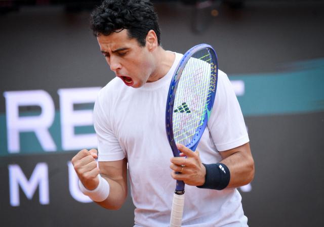 Spanish Jaume Munar celebrates a point against Italian Matteo Arnaldi during the ATP Rome Open tennis tournament at Foro Italico in Rome on May 6, 2026. (Photo by Tiziana FABI / AFP)