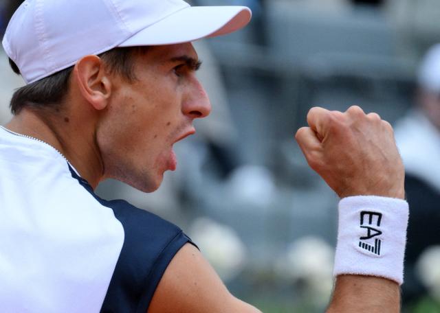 Italian Matteo Arnaldi celebrates a point against Spanish Jaume Munar during the ATP Rome Open tennis tournament at Foro Italico in Rome on May 6, 2026. (Photo by Tiziana FABI / AFP)