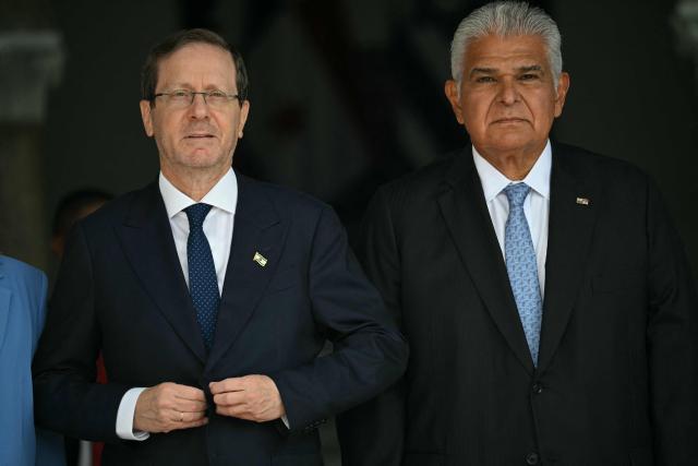 The President of Israel, Isaac Herzog (L), stands next to his Panamanian counterpart, Jose Raul Mulino, at the Las Garzas palace in Panama City on May 6, 2026. Herzog is on an official visit aimed at strengthening cooperation and friendship between both countries. (Photo by MARTIN BERNETTI / AFP)