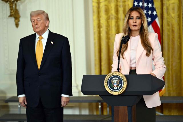 US President Donald Trump and First Lady Melania Trump participate in a Military Mother's Day Event in the East Room of the White House in Washington, DC, on May 6, 2026. (Photo by Kent NISHIMURA / AFP)