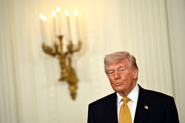 US President Donald Trump participates in a Military Mother's Day Event in the East Room of the White House in Washington, DC, on May 6, 2026. (Photo by Kent NISHIMURA / AFP)
