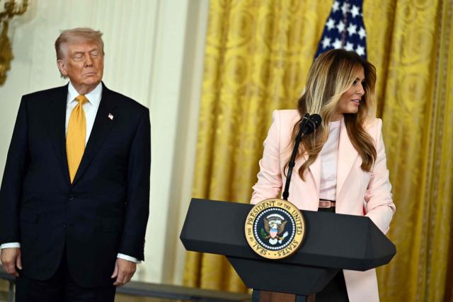 US President Donald Trump and First Lady Melania Trump participate in a Military Mother's Day Event in the East Room of the White House in Washington, DC, on May 6, 2026. (Photo by Kent NISHIMURA / AFP)