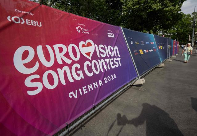 A wind-blown portion of a fence around the fan zone of the 2026 Eurovision Song Contest is seen outside the Wiener Stadthalle in Vienna, Austria, on May 6, 2026. (Photo by Joe Klamar / AFP)