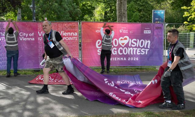 Workers install a fence around the fan zone of the 2026 Eurovision Song Contest, outside the Wiener Stadthalle (Viennese City Hall) in Vienna, Austria on May 06, 2026. (Photo by Joe Klamar / AFP)
