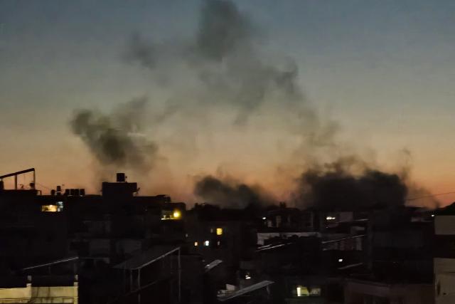 Smoke rises from the site of an Israeli airstrike that targeted Beirut’s southern suburbs neighbourhood of Haret Hreik on May 6, 2026. An Israeli strike in Lebanon's eastern Bekaa valley killed four people on May 6, while the Israeli army said it struck Hezbollah targets in the south, after warning residents of a dozen towns to evacuate. Israel and Hezbollah have been trading accusations of violating the ceasefire agreement in force since April 17. (Photo by AFP)
