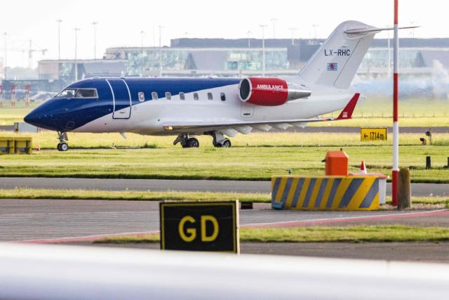 This photograph shows a Bombardier Challenger 605 medical aircraft allegedly carrying some of the passengers believed to be infected with hantavirus from the cruise ship MV Hondius at Schiphol Airport in Amsterdam on May 6, 2026. A plane that left Cape Verde following the evacuation of a cruise ship hit by the hantavirus landed in Spain's Canary Islands on May 6, while a second flight headed for the Netherlands. (Photo by Jeffrey Groeneweg / ANP / AFP) / Netherlands OUT