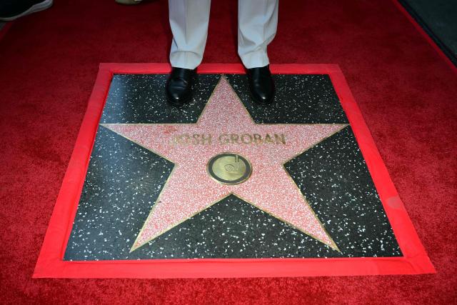 US singer-songwriter Josh Groban stands by his newly unveiled star during his Walk of Fame star ceremony in Hollywood, California, on May 6, 2026. (Photo by Frederic J. Brown / AFP)