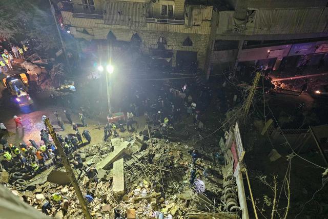 First responders gather at the site of an Israeli airstrike in Beirut’s southern suburb of Haret Hreik neighborhood on May 6, 2026. An Israeli strike in Lebanon's eastern Bekaa valley killed four people on May 6, while the Israeli army said it struck Hezbollah targets in the south, after warning residents of a dozen towns to evacuate. Israel and Hezbollah have been trading accusations of violating the ceasefire agreement in force since April 17. (Photo by AFP)