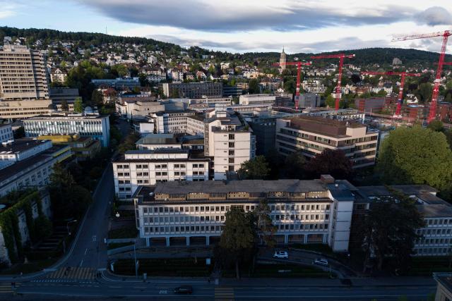 This aerial photograph shows a view of the University Hospital Zurich (USZ) where a former passenger of a cruise ship stricken by a deadly hantavirus outbreak is being treated, in Zurich on May 6, 2026. The Dutch-flagged cruise ship MV Hondius has been at the centre of an international health scare since last weekend, when the UN's health agency was informed that three passengers had died and the suspected cause was hantavirus. The rare disease is usually spread from infected rodents, typically through urine, droppings and saliva. (Photo by ENNIO LEANZA / AFP)