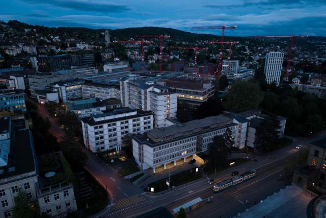 This aerial photograph shows a view of the University Hospital Zurich (USZ) where a former passenger of a cruise ship stricken by a deadly hantavirus outbreak is being treated, in Zurich on May 6, 2026. The Dutch-flagged cruise ship MV Hondius has been at the centre of an international health scare since last weekend, when the UN's health agency was informed that three passengers had died and the suspected cause was hantavirus. The rare disease is usually spread from infected rodents, typically through urine, droppings and saliva. (Photo by ENNIO LEANZA / AFP)