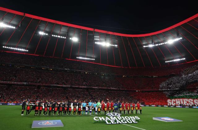 Teams line up prior to the start of the UEFA Champions League second-leg, semi-final football match between FC Bayern Munich and Paris Saint-Germain (PSG) in Munich, southern Germany on May 6, 2026. (Photo by Franck FIFE / AFP)
