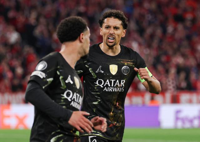 Paris Saint-Germain's French midfielder #33 Warren Zaire-Emery (L) and Paris Saint-Germain's Brazilian defender #05 Marquinhos react during the UEFA Champions League second-leg, semi-final football match between FC Bayern Munich and Paris Saint-Germain (PSG) in Munich, southern Germany on May 6, 2026. (Photo by FRANCK FIFE / AFP)
