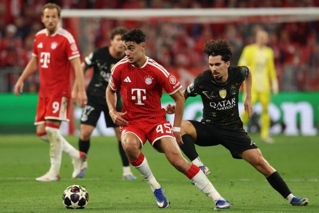 Bayern Munich's German midfielder #45 Aleksandar Pavlovic and Paris Saint-Germain's Portuguese midfielder #17 Vitinha vie for the ball during the UEFA Champions League second-leg, semi-final football match between FC Bayern Munich and Paris Saint-Germain (PSG) in Munich, southern Germany on May 6, 2026. (Photo by Odd ANDERSEN / AFP)