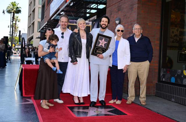 US singer-songwriter Josh Groban (C/R) poses with his fiance Natalie McQueen (C/L), his parents Jack (R) and Melinda Groban (2nd-R) and other relatives during his Walk of Fame unveiling star ceremony in Hollywood, California, on May 6, 2026. (Photo by Frederic J. BROWN / AFP)
