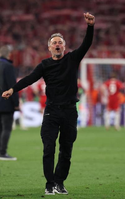 Paris Saint-Germain's Spanish head coach Luis Enrique celebrates after the UEFA Champions League second-leg, semi-final football match between FC Bayern Munich and Paris Saint-Germain (PSG) in Munich, southern Germany on May 6, 2026. (Photo by FRANCK FIFE / AFP)