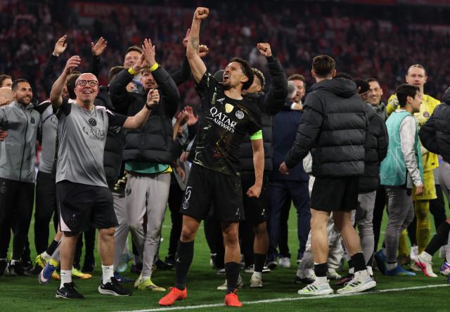 Paris Saint-Germain's Brazilian defender #05 Marquinhos (C) celebrates after the UEFA Champions League second-leg, semi-final football match between FC Bayern Munich and Paris Saint-Germain (PSG) in Munich, southern Germany on May 6, 2026. (Photo by FRANCK FIFE / AFP)