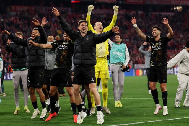 Paris Saint-Germain's Spanish midfielder #08 Fabian Ruiz (front C) and team mates celebrate at the end of the UEFA Champions League second-leg, semi-final football match between FC Bayern Munich and Paris Saint-Germain (PSG) in Munich, southern Germany on May 6, 2026. (Photo by FRANCK FIFE / AFP)
