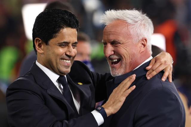 Paris Saint Germain's Qatari President Nasser al-Khelaifi (L) celebrates the team's win with French former footballer David Ginola after the UEFA Champions League second-leg, semi-final football match between FC Bayern Munich and Paris Saint-Germain (PSG) in Munich, southern Germany on May 6, 2026. (Photo by FRANCK FIFE / AFP)