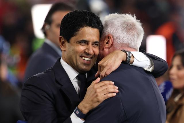 Paris Saint Germain's Qatari President Nasser al-Khelaifi (L) celebrates the team's win with French former footballer David Ginola after the UEFA Champions League second-leg, semi-final football match between FC Bayern Munich and Paris Saint-Germain (PSG) in Munich, southern Germany on May 6, 2026. (Photo by FRANCK FIFE / AFP)