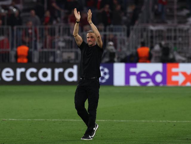 Paris Saint-Germain's Spanish head coach Luis Enrique celebrates after the UEFA Champions League second-leg, semi-final football match between FC Bayern Munich and Paris Saint-Germain (PSG) in Munich, southern Germany on May 6, 2026. (Photo by FRANCK FIFE / AFP)