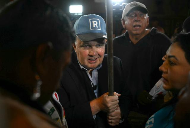 Peru's presidential candidate for the Renovacion Popular party, Rafael Lopez Aliaga, attends a rally to demand respect for the recent elections in Lima on May 6, 2026. (Photo by ERNESTO BENAVIDES / AFP)