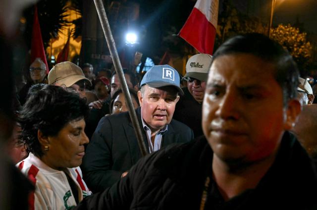 Peru's presidential candidate for the Renovacion Popular party, Rafael Lopez Aliaga, attends a rally to demand respect for the recent elections in Lima on May 6, 2026. (Photo by ERNESTO BENAVIDES / AFP)