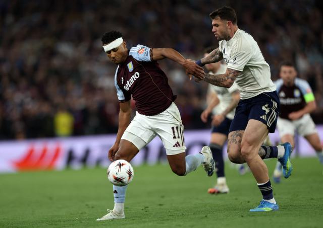 Nottingham Forest's Brazilian defender #04 Morato (R) vies with Aston Villa's English striker #11 Ollie Watkins during the UEFA Europa League, semi-final second-leg football match between Aston Villa and Nottingham Forest at Villa Park in Birmingham, central England on May 7, 2026. (Photo by Darren Staples / AFP)