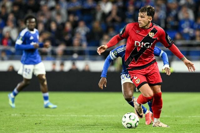 Rayo Vallecano's Romanian defender #02 Andrei Ratiu controls the ball during the UEFA Conference League semi-final second leg football match between RC Strasbourg Alsace and Rayo Vallecano de Madrid at Stade de la Meinau in Strasbourg, eastern France on May 7, 2026. (Photo by SEBASTIEN BOZON / AFP)
